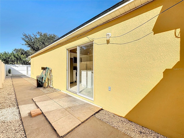 view of home's exterior with a patio area