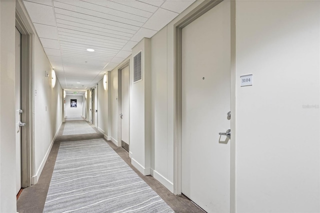 corridor with carpet floors