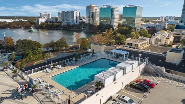 birds eye view of property featuring a water view