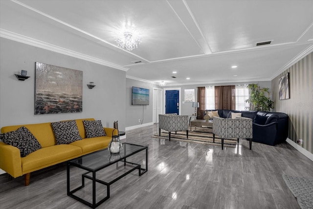 living room featuring wood-type flooring and ornamental molding