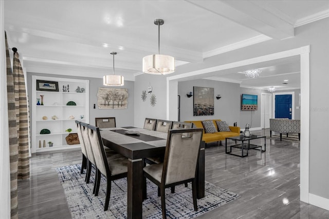 dining area with beamed ceiling, ornamental molding, built in shelves, and hardwood / wood-style flooring