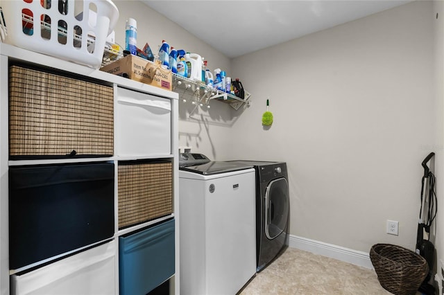 laundry room with washer and clothes dryer