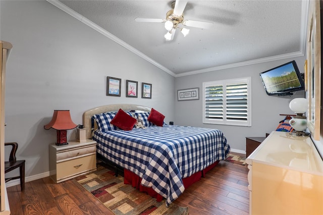 bedroom with baseboards, lofted ceiling, wood-type flooring, a textured ceiling, and crown molding