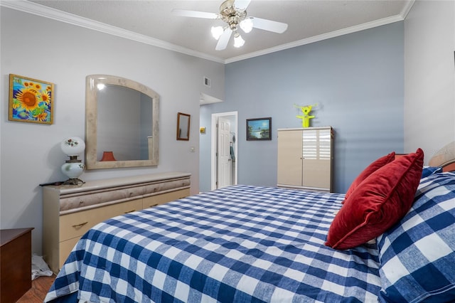 bedroom with ceiling fan, visible vents, and crown molding