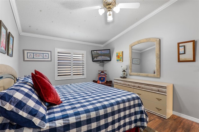 bedroom with ornamental molding, vaulted ceiling, a textured ceiling, and wood finished floors