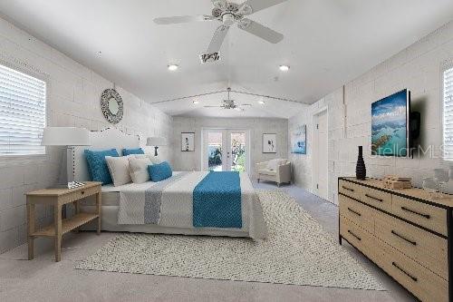 bedroom with concrete flooring, a ceiling fan, vaulted ceiling, access to outside, and french doors