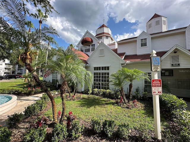 11538 Westwood Blvd Unit 226, Orlando, FL 32821 - view of front facade featuring a front yard