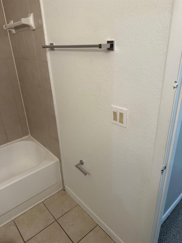 11538 Westwood Blvd Unit 226, Orlando, FL 32821 - full bathroom with tile patterned flooring and tub / shower combination