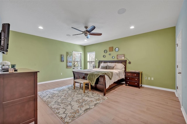 bedroom featuring ceiling fan and light wood-type flooring