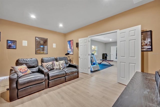 home theater featuring light hardwood / wood-style floors