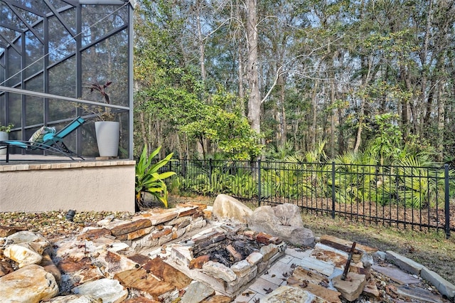 view of patio / terrace with a lanai