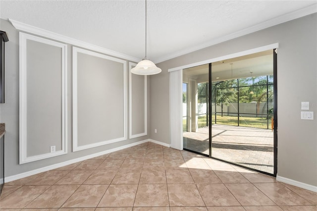 unfurnished dining area featuring light tile patterned floors, a textured ceiling, and crown molding