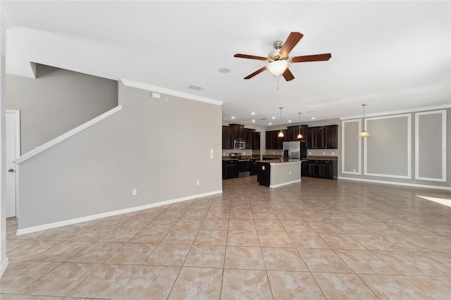 unfurnished living room with ceiling fan, light tile patterned floors, and ornamental molding