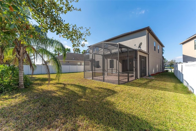 view of yard with a lanai and a patio