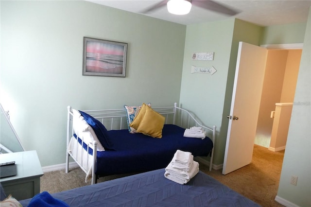 bedroom featuring ceiling fan and carpet flooring