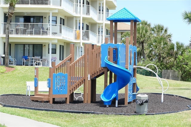 view of playground with a yard