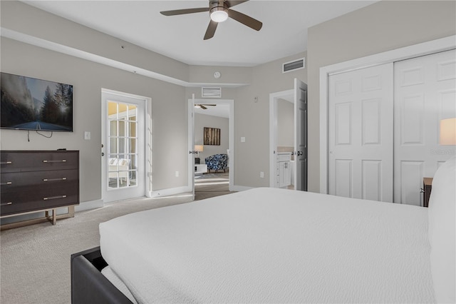 bedroom with access to exterior, ceiling fan, a closet, and light colored carpet