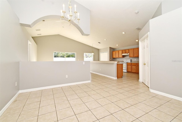 kitchen with a center island, lofted ceiling, an inviting chandelier, white range, and light tile patterned floors