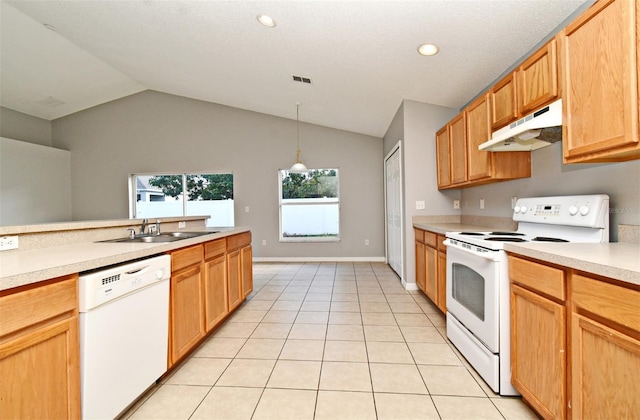 kitchen with lofted ceiling, white appliances, sink, hanging light fixtures, and light tile patterned floors