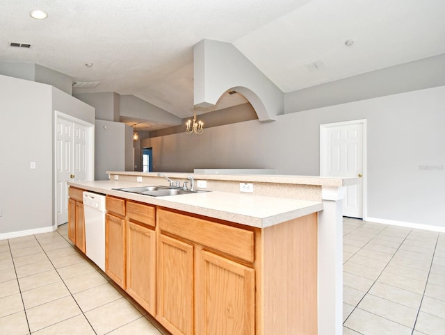 kitchen featuring dishwasher, lofted ceiling, a kitchen island with sink, sink, and light tile patterned flooring