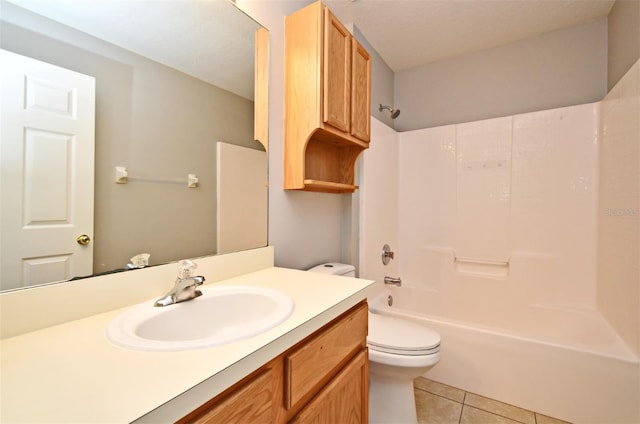 full bathroom featuring tile patterned flooring, vanity, bathtub / shower combination, and toilet