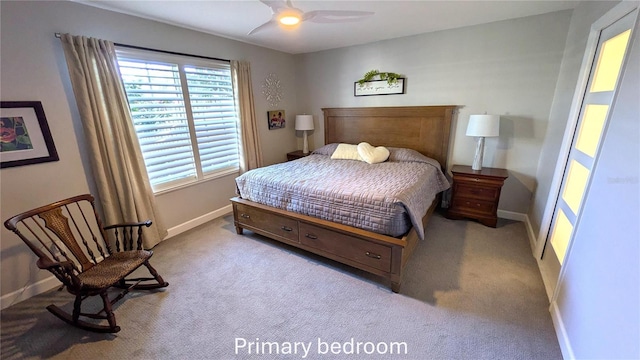 bedroom featuring light carpet and ceiling fan