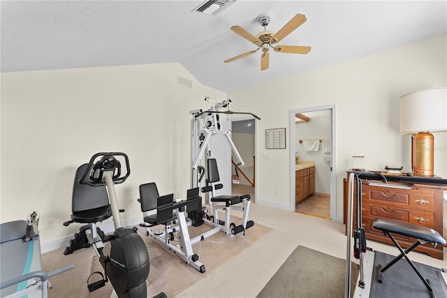 exercise area with ceiling fan, lofted ceiling, and light carpet