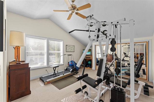 workout area with ceiling fan, carpet floors, and vaulted ceiling