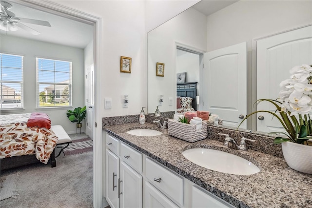 bathroom featuring ceiling fan and vanity