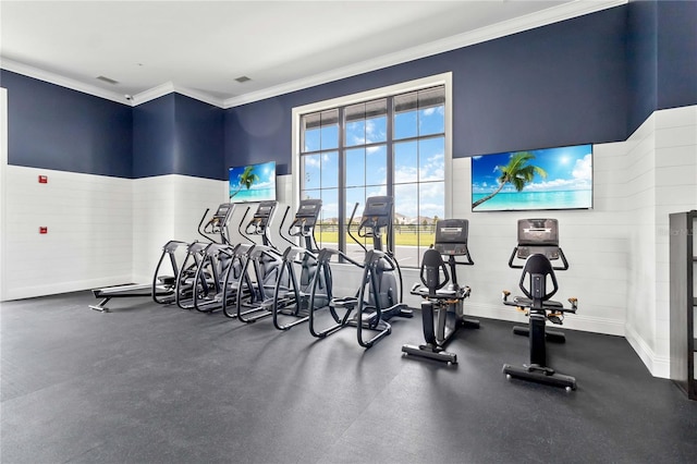 gym with ornamental molding