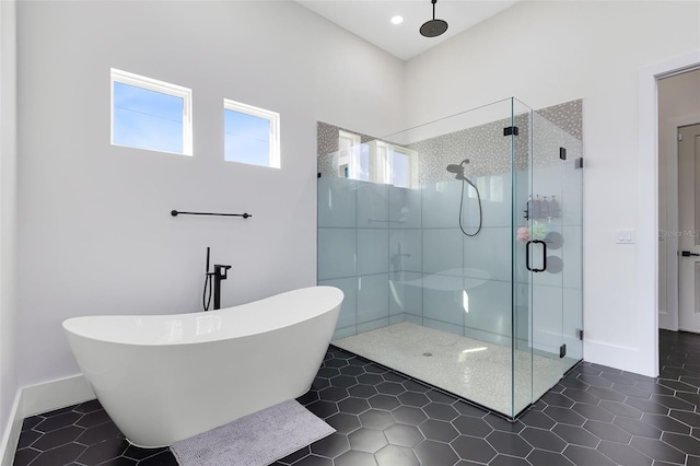 bathroom with plus walk in shower and tile patterned floors