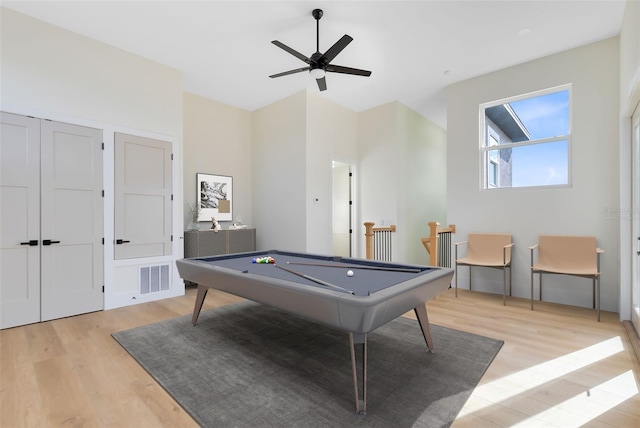 rec room with pool table, ceiling fan, and light hardwood / wood-style floors