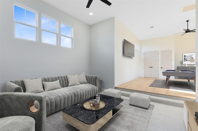 living room featuring pool table and ceiling fan