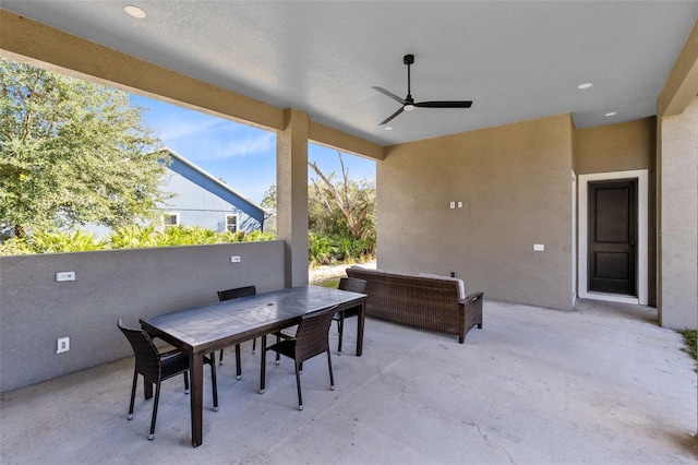 view of patio with ceiling fan