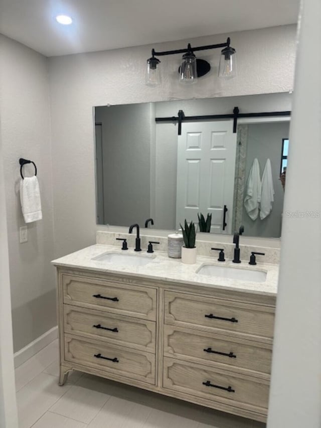 bathroom featuring tile patterned floors and vanity