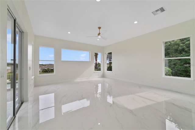 unfurnished room featuring ceiling fan