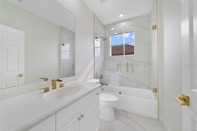 full bathroom featuring vanity, enclosed tub / shower combo, and toilet