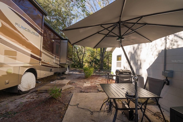 view of patio / terrace featuring a grill