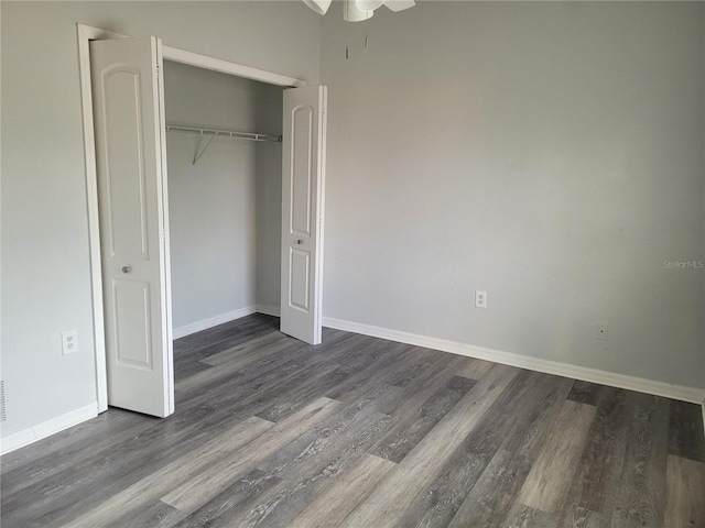 155 N Pearl Lake Cswy Unit 200, Altamonte Springs, FL 32714 - unfurnished bedroom with dark wood-style flooring and a closet