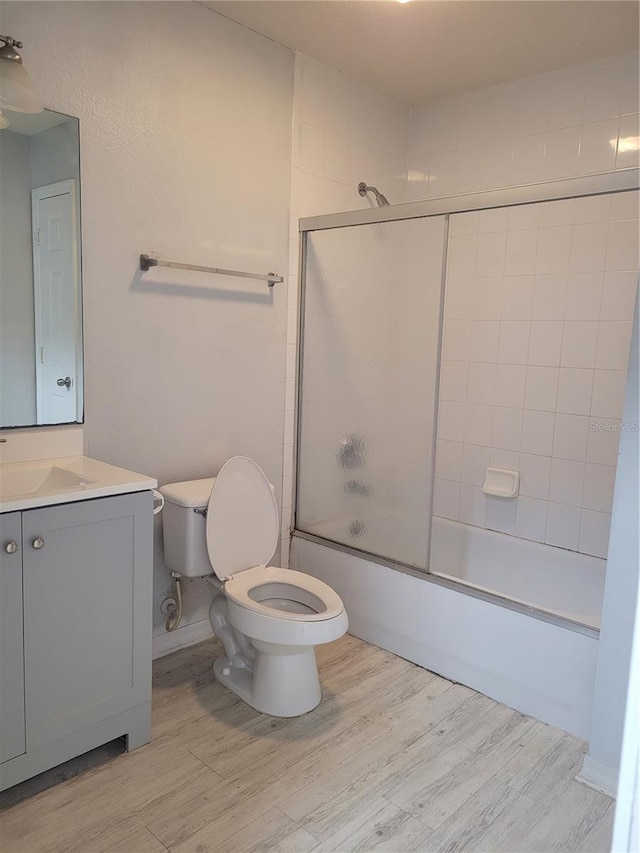 155 N Pearl Lake Cswy Unit 200, Altamonte Springs, FL 32714 - bathroom with vanity, wood finished floors, and combined bath / shower with glass door
