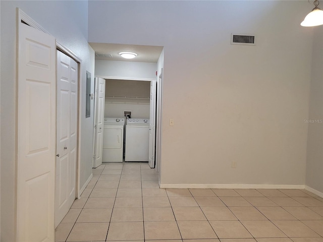 155 N Pearl Lake Cswy Unit 200, Altamonte Springs, FL 32714 - laundry room featuring light tile patterned floors and washing machine and clothes dryer
