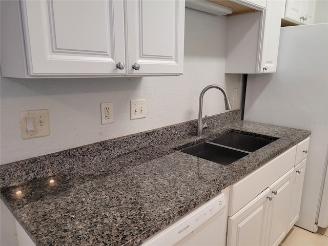 155 N Pearl Lake Cswy Unit 200, Altamonte Springs, FL 32714 - kitchen featuring white cabinets, dark stone counters, and dishwasher
