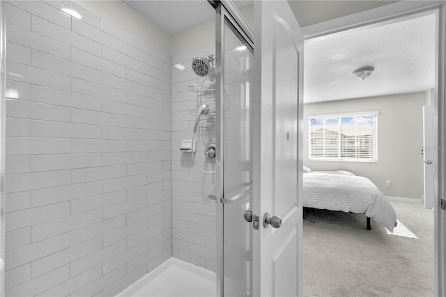 bathroom featuring tiled shower