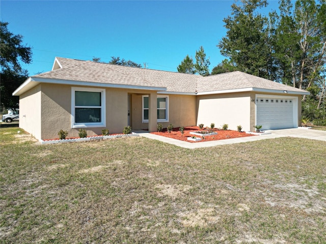 single story home with a front yard and a garage