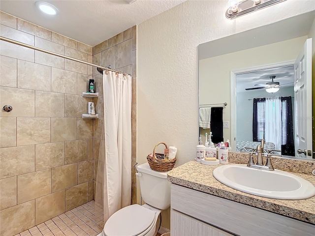 bathroom with ceiling fan, vanity, curtained shower, and toilet