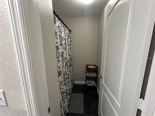 bathroom with tile patterned flooring