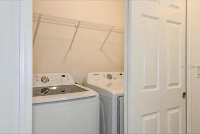 laundry area featuring washer and dryer