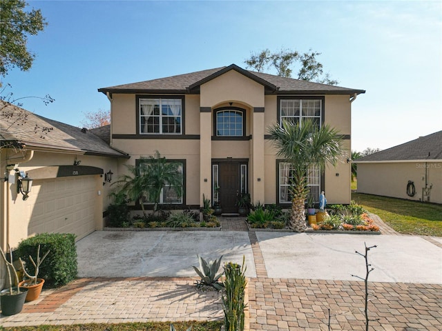 view of front of home with a garage