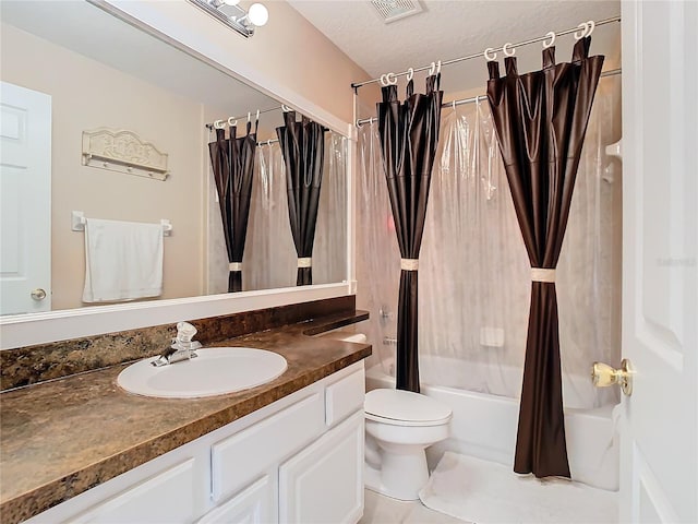 full bathroom featuring toilet, tile patterned floors, vanity, shower / bath combo, and a textured ceiling