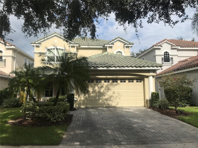 view of front of property featuring a garage